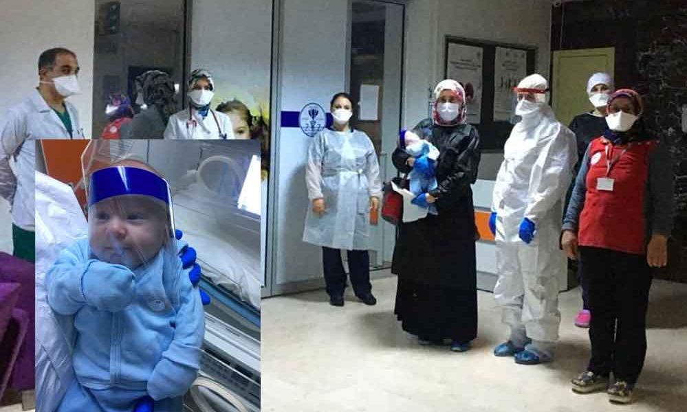 Koronavirüsü yenen 17 günlük bebek ile anne ve babası alkışlarla taburcu edildi
