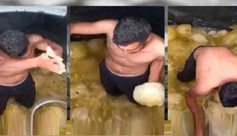 Sosyal medyada tepki toplayan görüntüler: Çıplak ayakları ve kıyafetleriyle turşu tankının içine girdi