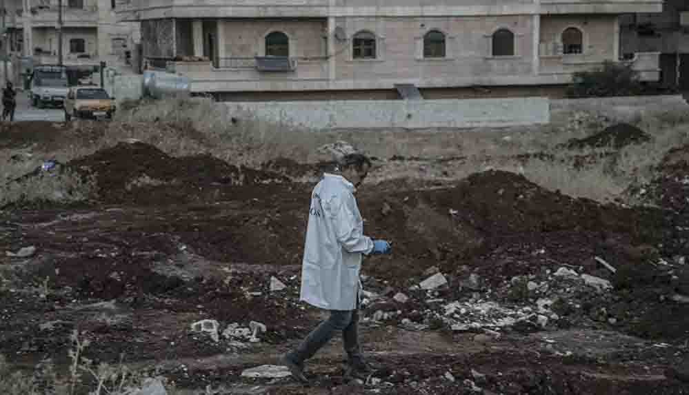 Afrin'de toplu mezarda bulunan ceset sayısının 61'e ulaştığı açıklandı