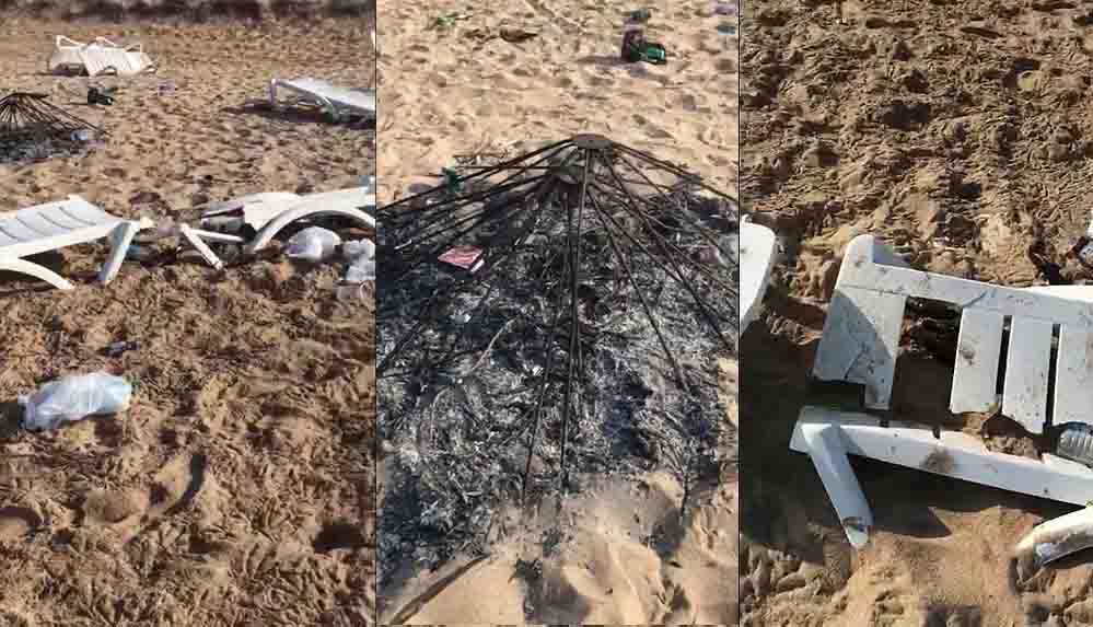 Tatilciler, Bozcaada sahilindeki partide şezlongları kırıp şemsiye yaktılar