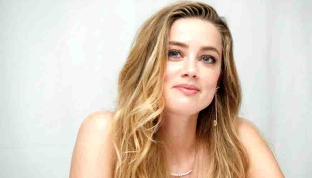 Ünlü oyuncu Amber Heard taşıyıcı anneyle bebek sahibi oldu