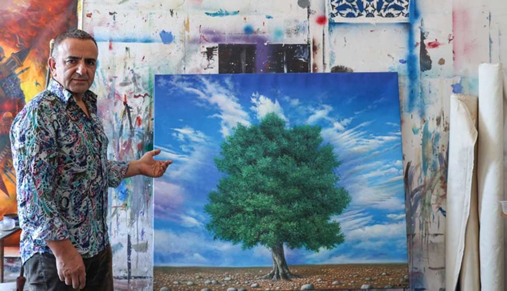 Ressam İsmail Acar, yanan ormanların ihyası için Bizim Dünyamız Vakfı'na eserini bağışladı