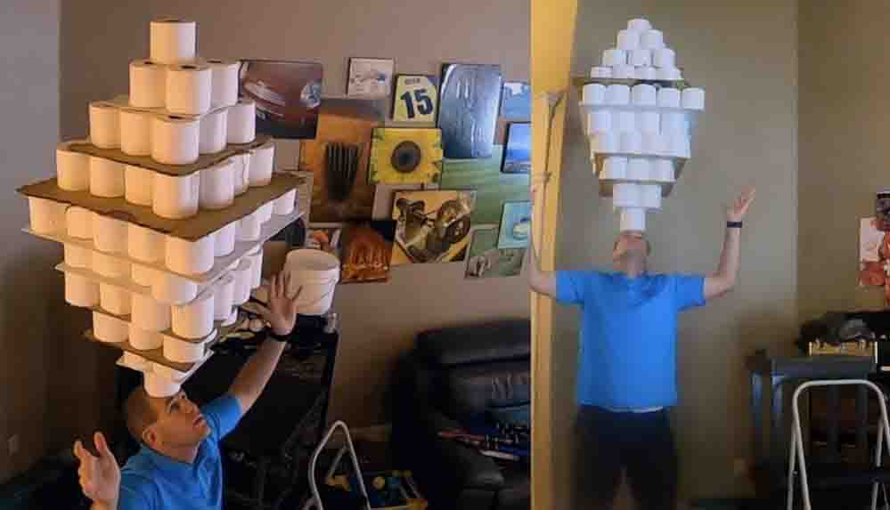 Kafasının üzerinde 101 tuvalet kağıdı rulosu taşıdı; Guinness Rekorlar Kitabı'na girdi