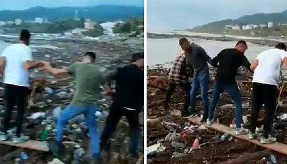 Sinop'ta denize sürüklenen köpek insan zinciri ile kurtarıldı