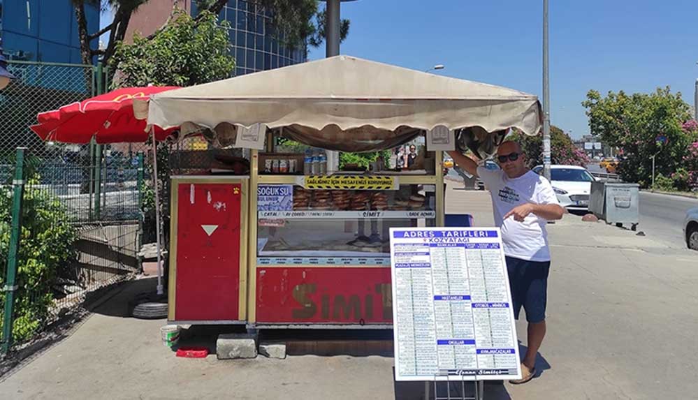 Adres-tarifinden-bıkan-simitçi-tezgahına-tabela-koydu