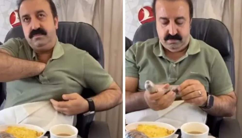 MasterChef’ten elenen Şırdancı Mehmet uçakta VIP menüyü beğenmedi, göğsünden çıkardığı şırdanı yedi