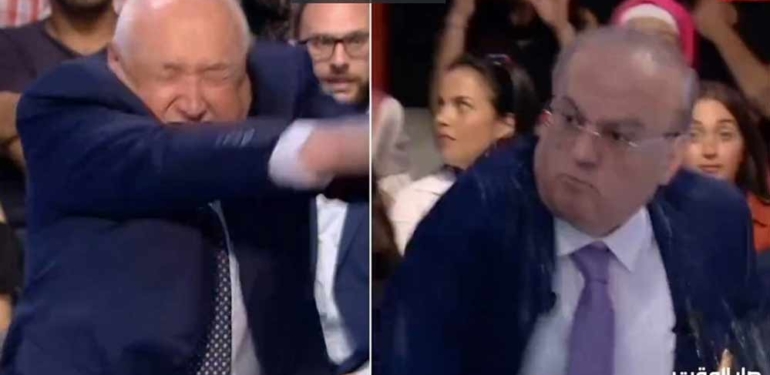 Lübnan televizyonunda gazeteci ve eski bakan yumruk yumruğa kavga etti
