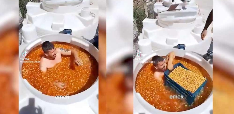 Mide bulandıran görüntüler: Çıplak şekilde zeytin tankına girip zeytinleri sepetledi